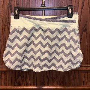 Lime green and yellow  ivivva skirt (size 14)